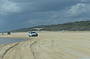 Plane landing on 75 Mile Beach
